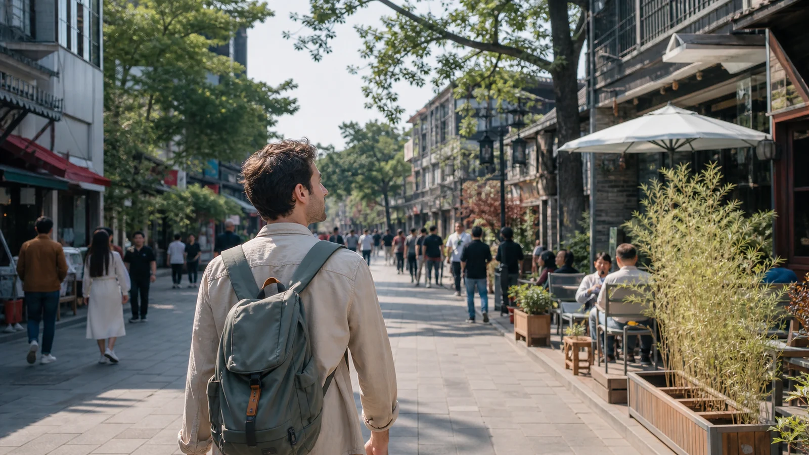 A traveler walking through a lively street in China